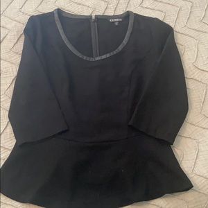 Black Express peplum shirt with leather trim.